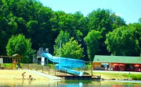 Sandy beach, flume, play area and cafe at St Macoux