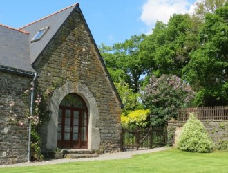 The Coach House main entrance facing the linden lawn