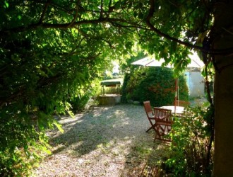 View of the Front Terrace with Original Well