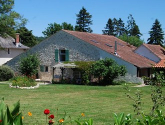 View from out side Racachi gite with garden and south west facing terrace.