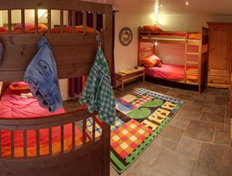 Large bunk room - sleeps 4 in two bunks - downstairs away from the adults - Bliss!
