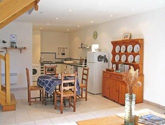 Le Poulain - kitchen and dining area