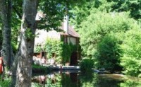 Moulin des Vaux cottage overlooking weir and river